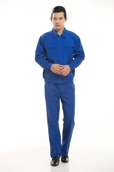 The young engineer various occupation clothing standing in front of a white background