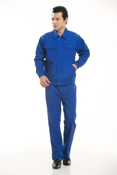 The young engineer various occupation clothing standing in front of a white background