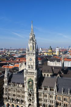 View of medieval Town Hall building with spires Munich Germany.