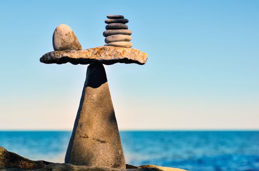 Well-balanced of pebbles on the top of stone