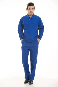 The young engineer various occupation clothing standing in front of a white background