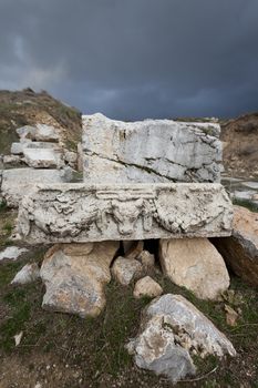 Stone piece with carved ram head in ruins at Antioch Pisidian in Turkey