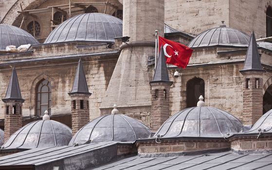 Turkish flag on exterior of Rumi Museum in Konya