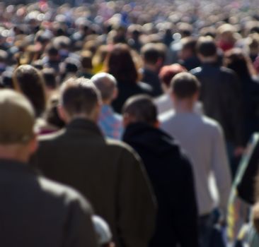 Crowd of people at the street, city center 