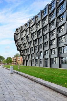 Almere, Netherlands - May 5, 2015: Apartment building 'The Wave' by architect Rene van Zuuk in this modern city center of Almere, Flevoland on May 5, 2015.