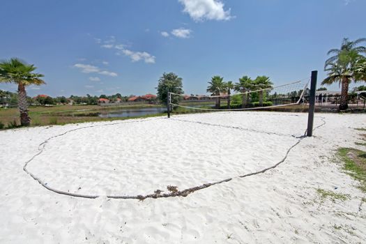 A sand volleyball court in a resort