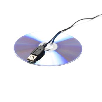 usb cable on dvd dish isolated on white background