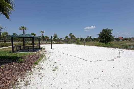 A sand volleyball court in a resort