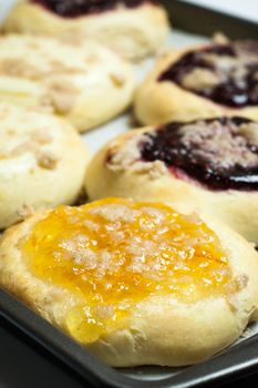 Raspberry, Orange, and Cream Cheese filled Kolache pastries.