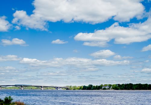 blue cloudy sky over Dnipro river in Kiev Ukraine