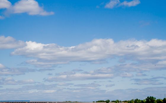 blue cloudy sky over Dnipro river in Kiev Ukraine