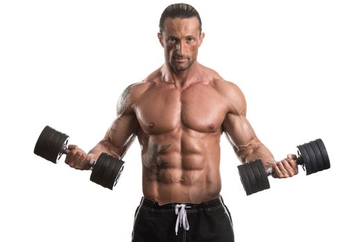 Muscular Bodybuilder Guy Doing Exercises With Dumbbells Over White Background