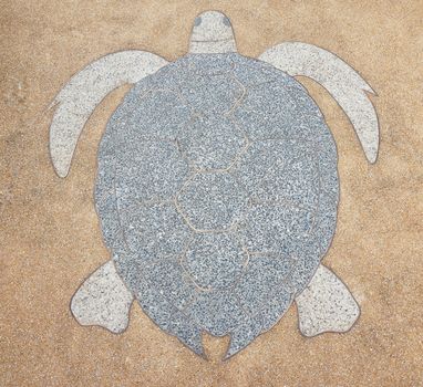 Terrazzo floor outside is brown color, inside is lined with snapping turtle.                               