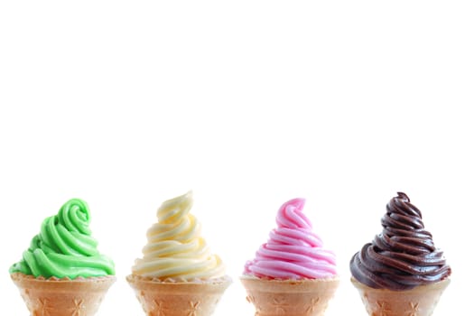 Assorted flavored ice cream cones including classic vanilla, mint, strawberry and chocolate 