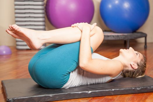 Woman stretching in yoga