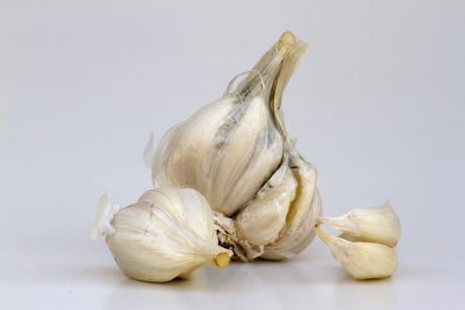 Ripe juicy garlic on the  background.