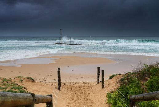 Mona Vale rockpool on Sydney's northern beaches, being smashed by large waves in a 3 metre swell