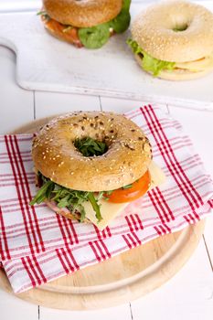 Delicious bagel sandwich on the table