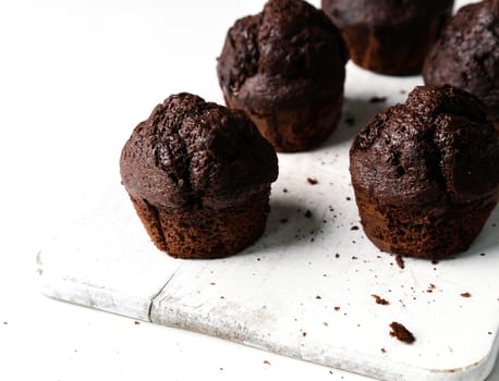 Delicious muffin on a white background