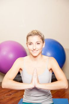 Woman meditating in yoga