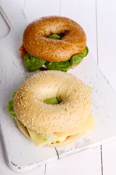 Delicious bagel sandwich on the table