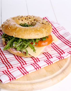 Delicious bagel sandwich on the table