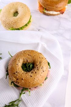 Delicious bagel sandwich on the table