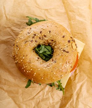 Delicious bagel sandwich on the table