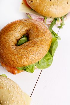 Delicious bagel sandwich on the table