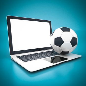 Picture a soccer ball and white laptop on a blue background