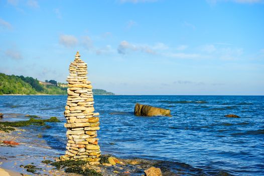 Pyramidal group of stones on the seashore