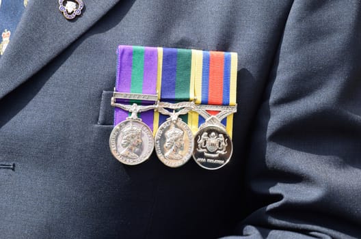 Medals pinned to chest