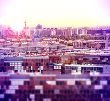 Overview of Spain city sunset. Blocks of flats and streets 