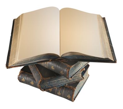 Old books stacked on top of one another with an open double page spread, clipping path included