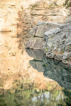 stone and  reflections at a quarry