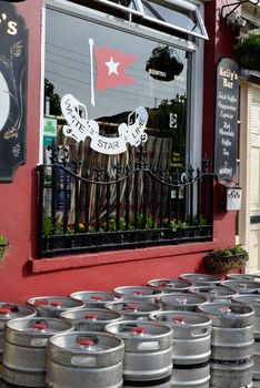 barrels in front of kellys bar in cobh county cork ireland