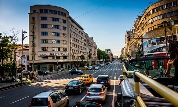 City bus touring on Magheru Boulevard, Bucharest, Romania.