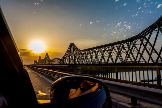 Orange sunset on Anghel Saligny Bridge, Romania.