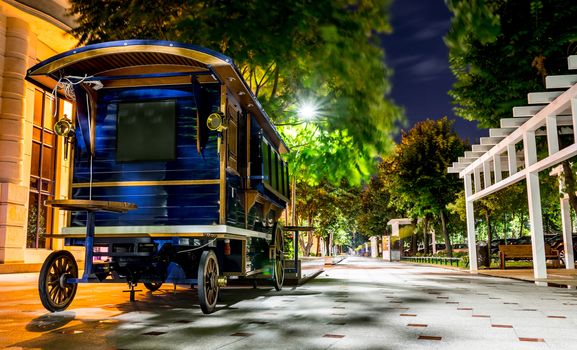 Retro blue waggon kiosk on new sidewalk, Bucharest.