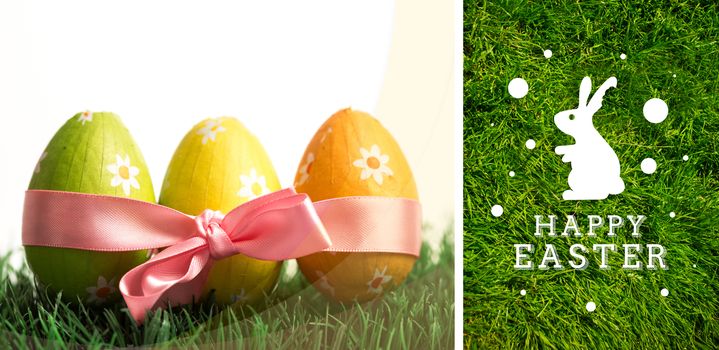 happy easter graphic against grass background
