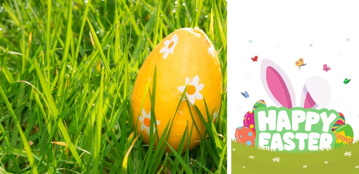happy easter graphic against orange easter egg in the grass