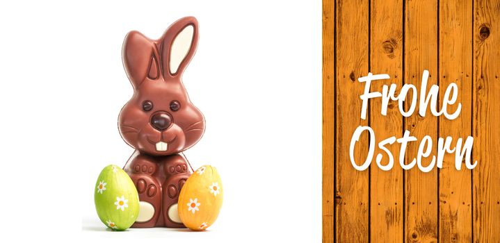 Frohe ostern against wooden planks