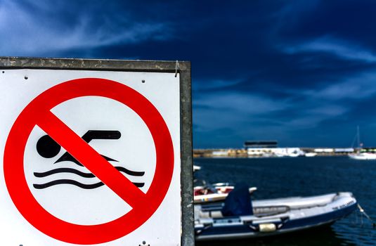 No swimming sign at the marina.