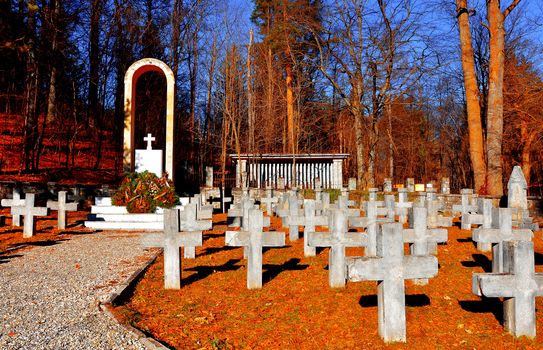 Empty grave crosses in unknown war heros cemetery.