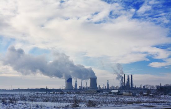 Pollution smoke clouds from energy plant.