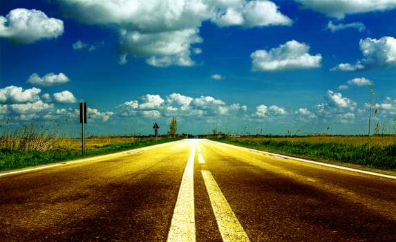 Shiny road on a sunny summer day.