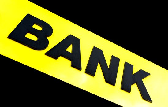 The word bank written on a yellow diagonal stripe.