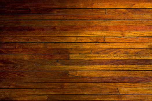 Old brown parquet texture, horizontal stripes.