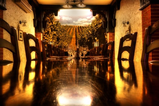 Table and chairs in dining room with vineyard painiting.