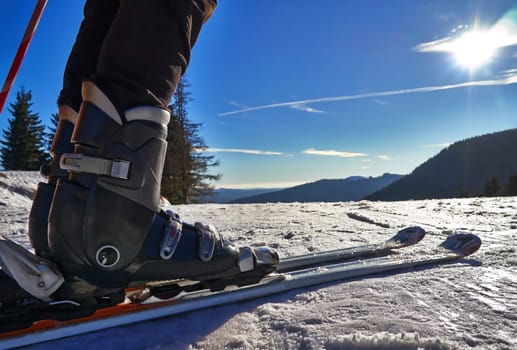 Winter sports with snow skier boots.   